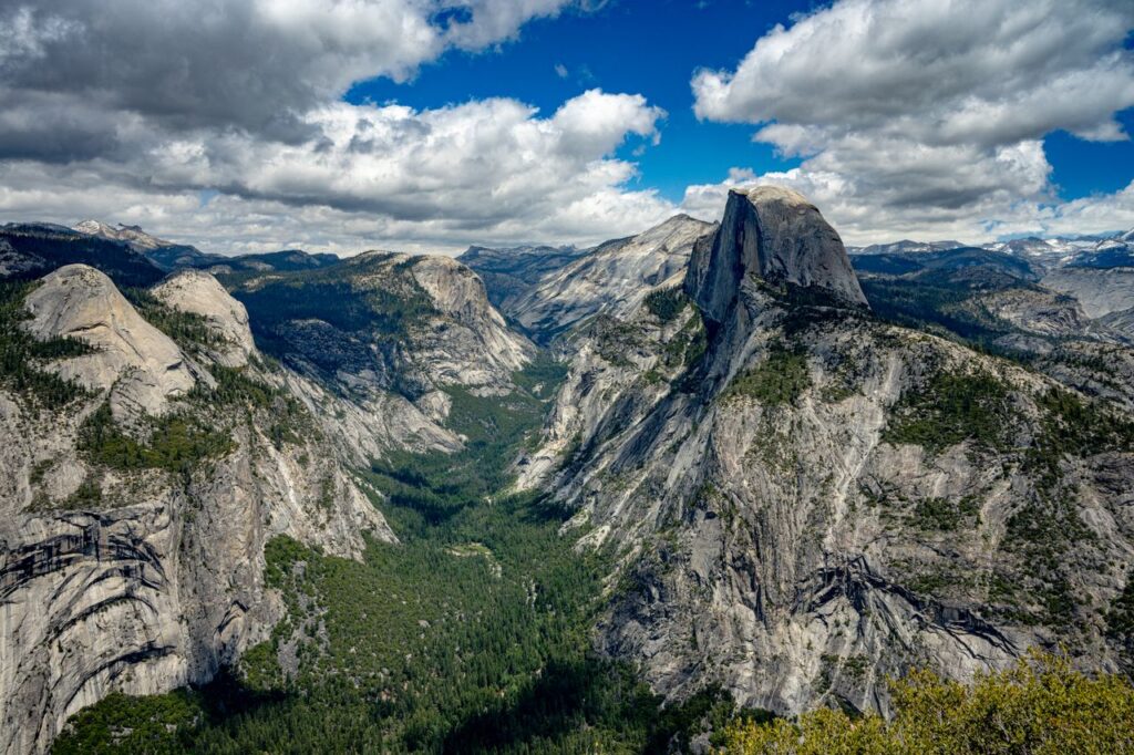 Stunning aerial view of Half Dome at Yosemite National Park, showcasing California's iconic landscape.